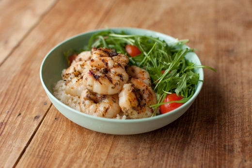 Marinated prawns with cous cous and tomatoes